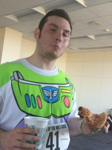 Enjoying the post-race meal of champions, Buzz chows down on some Pizza Planet fare.